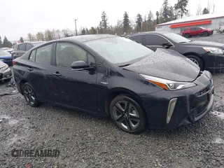 2022 Toyota Prius L Eco with VIN JTDKAMFU2N3154674, listed as a IAAI auction lot 41977505 with 61,552 mi miles and . Bid and sale history available at DreamBid. Image 1.