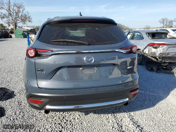 2021 Mazda CX-9 Grand Touring with VIN JM3TCADY1M0517525, listed as a Copart auction lot 43868965 with 123,602 mi miles and Salvage Title. Bid and sale history available at carsss.com. Image 6.
