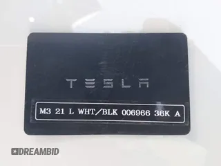 2021 Tesla Model 3 Long Range z VIN 5YJ3E1EB9MF006966, wystawiony jako IAAI lot #41976745 z przebiegiem 37 651 mil mil oraz . Historia ofert i sprzedaży dostępna na DreamBid. Obrazek 11.