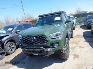 2021 Toyota Tacoma 4WD SR with VIN 3TMCZ5ANXMM382874, listed as a IAAI auction lot 41965388 with 62,178 mi miles. Bid and sale history available at carsss.com. Image 13.
