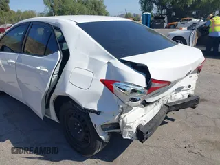 2016 Toyota Corolla L with VIN 5YFBURHE8GP523512, listed as a IAAI auction lot 42238432 with 134,118 mi miles and . Bid and sale history available at DreamBid. Image 6.
