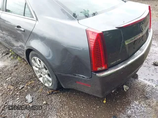 2009 Cadillac CTS AWD z VIN 1G6DT57V790133622, wystawiony jako IAAI lot #42272929 z przebiegiem 124 695 mil mil oraz . Historia ofert i sprzedaży dostępna na DreamBid. Obrazek 12.