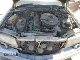 1990 Mercedes-Benz 300 with VIN WDBCA24D1LA529716, listed as a Copart auction lot 56581335 with 122,286 mi miles and Salvage Title. Bid and sale history available at DreamBid. Image 11.