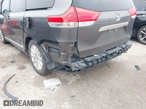 2011 Toyota Sienna XLE AAS with VIN 5TDYK3DC9BS158209, listed as a IAAI auction lot 42163526 with 107,385 mi miles and . Bid and sale history available at DreamBid. Image 6.