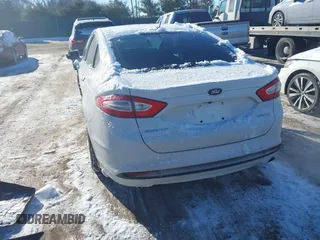 2013 Ford Fusion SE Hybrid with VIN 3FA6P0LU8DR272165, listed as a IAAI auction lot 41333539 with 196,843 mi miles. Bid and sale history available at carsss.com. Image 3.