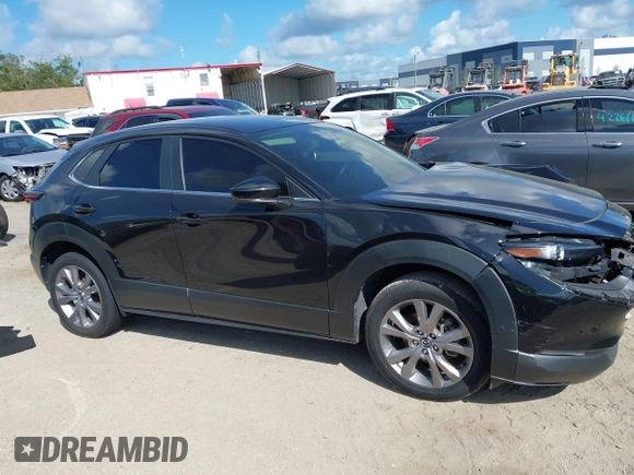 2021 Mazda CX-30 Select z VIN 3MVDMABL1MM251761, wystawiony jako IAAI lot #42267217 z przebiegiem 42 617 mil mil oraz . Historia ofert i sprzedaży dostępna na DreamBid. Obrazek 12.