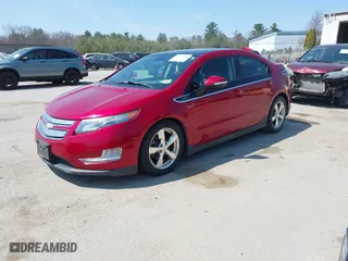2012 Chevrolet Volt with VIN 1G1RB6E48CU100885, listed as a IAAI auction lot 42060886 with 141,958 mi miles. Bid and sale history available at carsss.com. Image 2.