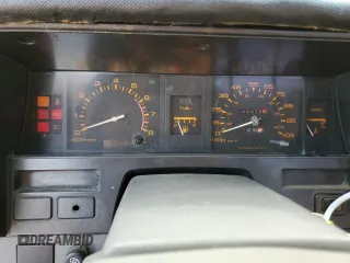 1989 Nissan Hardbody z VIN 1N6ND11S0KC342434, wystawiony jako Copart lot #71089274 z przebiegiem 300 076 mil mil oraz Szkody całkowita. Historia ofert i sprzedaży dostępna na DreamBid. Obrazek 9.