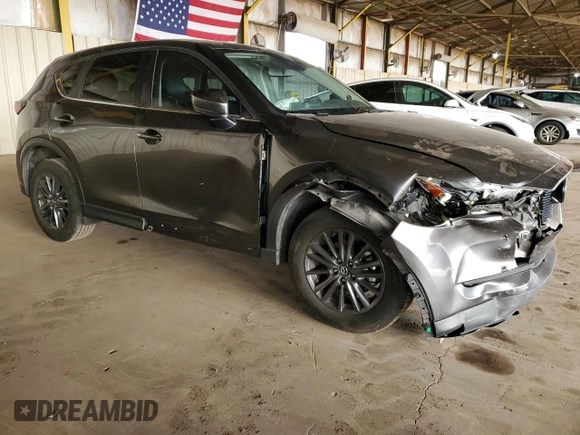 2020 Mazda CX-5 Touring with VIN JM3KFACM6L0804410, listed as a Copart auction lot 51009465 with 55,498 mi miles and Salvage Title. Bid and sale history available at carsss.com. Image 4.