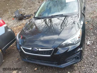 2017 Subaru Impreza Premium with VIN 4S3GTAB69H3704625, listed as a IAAI auction lot 41864611 with 71,352 mi miles. Bid and sale history available at carsss.com. Image 20.