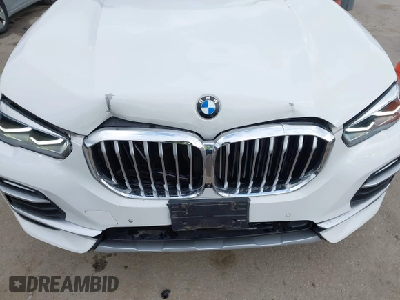 2021 BMW X5 xDrive40i with VIN 5UXCR6C03M9G36156, listed as a IAAI auction lot 42125009 with 30,877 mi miles. Bid and sale history available at carsss.com. Image 6.