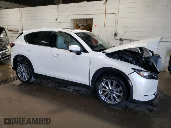 2020 Mazda CX-5 Grand Touring with VIN JM3KFBDM5L1851734, listed as a Copart auction lot 56729585 with 39,023 mi miles and Salvage title. Bid and sale history available at DreamBid. Image 4.