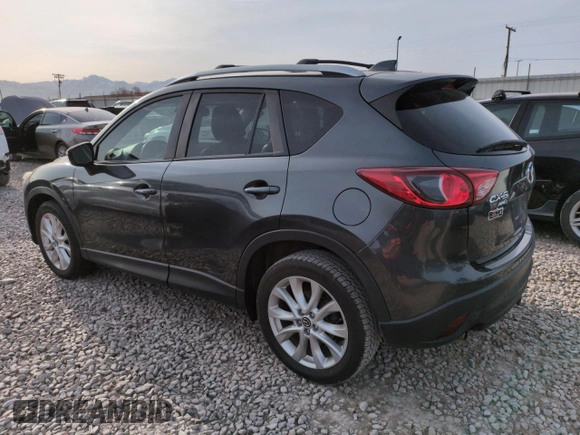 2015 Mazda CX-5 Grand Touring with VIN JM3KE4DY3F0495411, listed as a Copart auction lot 50077765 with 136,191 mi miles and Salvage Title. Bid and sale history available at DreamBid. Image 2.