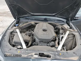 2022 Genesis G70 2.0T with VIN KMTG34TAXNU086582, listed as a Copart auction lot 55754305 with 69,711 mi miles and Salvage title. Bid and sale history available at DreamBid. Image 11.