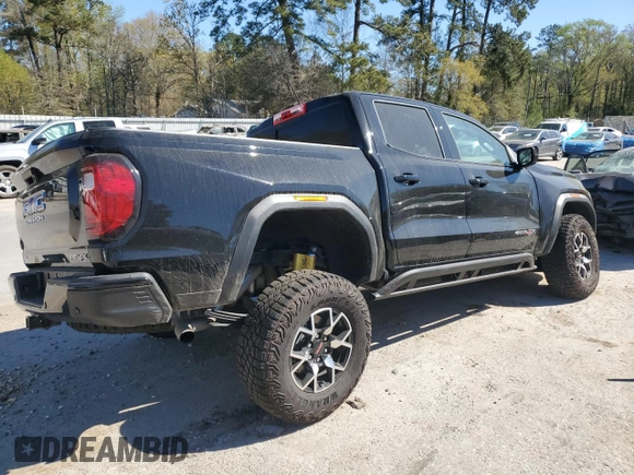 2024 GMC Canyon 4WD AT4X with VIN 1GTP6EEK7R1133432, listed as a Copart auction lot 49871295 with Not Provided miles and Salvage Title. Bid and sale history available at carsss.com. Image 3.