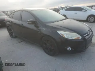 2014 Ford Focus SE with VIN 1FADP3F24EL324006, listed as a Copart auction lot 51219835 with 148,264 mi miles and Salvage Title. Bid and sale history available at carsss.com. Image 4.