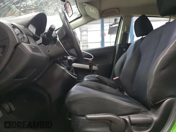 2012 Mazda 2 Sport with VIN JM1DE1KY9C0151578, listed as a Copart auction lot 52625055 with 123,812 mi miles and Salvage Title. Bid and sale history available at DreamBid. Image 7.
