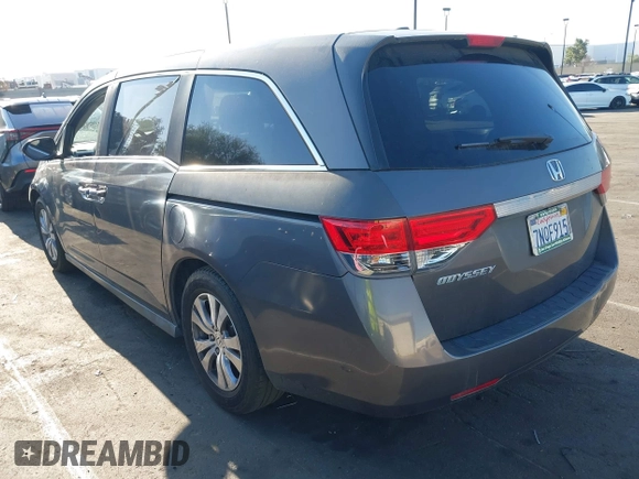 2015 Honda Odyssey EX-L with VIN 5FNRL5H61FB126933, listed as a IAAI auction lot 42003978 with 69,025 mi miles and . Bid and sale history available at carsss.com. Image 3.