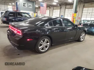 2012 Dodge Charger SXT with VIN 2C3CDXJG7CH183911, listed as a Copart auction lot 87046974 with 165,958 mi miles and Salvage Title. Bid and sale history available at carsss.com. Image 3.