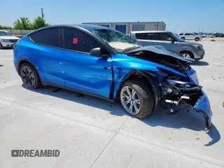 2024 Tesla Model Y Long Range z VIN 7SAYGDEE3RA238059, wystawiony jako Copart lot #61395925 z przebiegiem 14 991 mil mil oraz Szkoda całkowita • Salvage title. Historia ofert i sprzedaży dostępna na DreamBid. Obrazek 4.