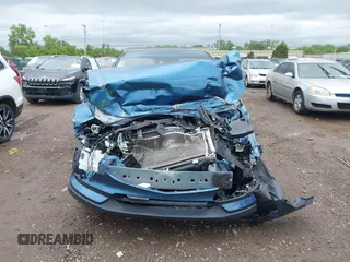 2017 Mazda CX-5 Touring z VIN JM3KFBCL9H0224962, wystawiony jako IAAI lot #42312104 z przebiegiem Nie podano mil oraz . Historia ofert i sprzedaży dostępna na DreamBid. Obrazek 13.