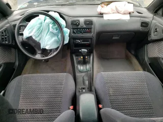1998 Subaru Legacy Outback with VIN 4S3BG6850W7601142, listed as a Copart auction lot 57319505 with 227,489 mi miles and Salvage title. Bid and sale history available at DreamBid. Image 8.