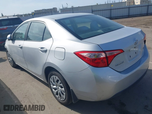 2019 Toyota Corolla L with VIN 2T1BURHE2KC190975, listed as a IAAI auction lot 41901370 with 94,925 mi miles. Bid and sale history available at carsss.com. Image 3.