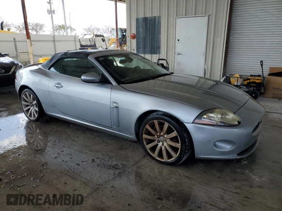 2009 Jaguar XK with VIN SAJWA44B595B31777, listed as a Copart auction lot 52026515 with Not Provided miles and Clean Title. Bid and sale history available at DreamBid. Image 4.
