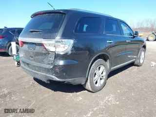 2013 Dodge Durango Crew with VIN 1C4RDJDG6DC540482, listed as a IAAI auction lot 41813209 with 140,875 mi miles. Bid and sale history available at carsss.com. Image 4.