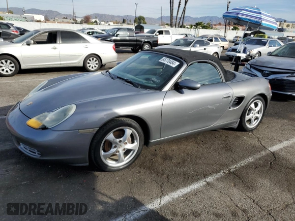2002 Porsche Boxster z VIN WP0CA29862U621821, wystawiony jako Copart lot #85770484 z przebiegiem 121 843 mil mil oraz Czysty tytuł • Clean title. Historia ofert i sprzedaży dostępna na DreamBid. Obrazek 1.