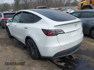 2024 Tesla Model Y Performance with VIN 7SAYGDEF4RA278532, listed as a IAAI auction lot 41511769 with 9,487 mi miles and . Bid and sale history available at DreamBid. Image 3.