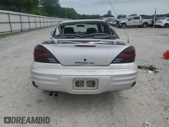 2001 Pontiac Grand Am with VIN 1G2NE12TX1M668035, listed as a Copart auction lot 59700585 with 60,965 mi miles and Salvage title. Bid and sale history available at DreamBid. Image 6.