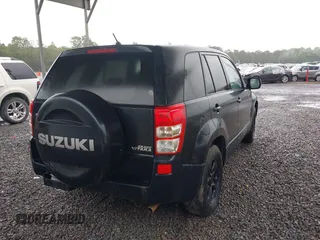 2010 Suzuki Grand Vitara Premium z VIN JS3TE0D25A4100407, wystawiony jako IAAI lot #42249747 z przebiegiem 138 781 mil mil oraz . Historia ofert i sprzedaży dostępna na DreamBid. Obrazek 4.