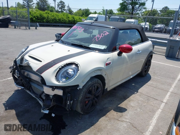 2021 MINI Convertible with VIN WMWWJ9C0XM3M07302, listed as a IAAI auction lot 42027854 with 30,921 mi miles and . Bid and sale history available at DreamBid. Image 20.