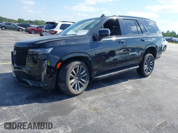 2023 Cadillac Escalade 4WD Sport z VIN 1GYS4EKLXPR513435, wystawiony jako IAAI lot #42137452 z przebiegiem 27 495 mil mil oraz . Historia ofert i sprzedaży dostępna na DreamBid. Obrazek 18.