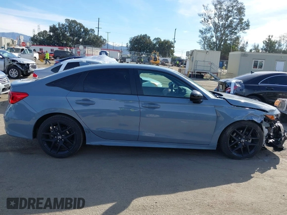 2024 Honda Civic Sport with VIN 2HGFE2F59RH562595, listed as a IAAI auction lot 41681632 with 18,217 mi miles and . Bid and sale history available at DreamBid. Image 13.