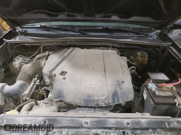 2009 Toyota Tacoma z VIN 3TMLU42N79M027000, wystawiony jako Copart lot #58371365 z przebiegiem 168 989 mil mil oraz Szkoda całkowita • Salvage title. Historia ofert i sprzedaży dostępna na DreamBid. Obrazek 11.