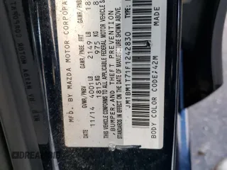 2015 Mazda 3 i SV with VIN JM1BM1T71F1242830, listed as a Copart auction lot 79832884 with Not Provided miles and Salvage Title. Bid and sale history available at DreamBid. Image 12.