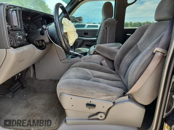 2004 Chevrolet Suburban LS с VIN 3GNEC16Z74G325942, выставлен на аукционе Copart как лот 60229585 с пробегом Не указан миль и Списание • Salvage title. История ставок и продаж доступна на DreamBid. Изображение 7.
