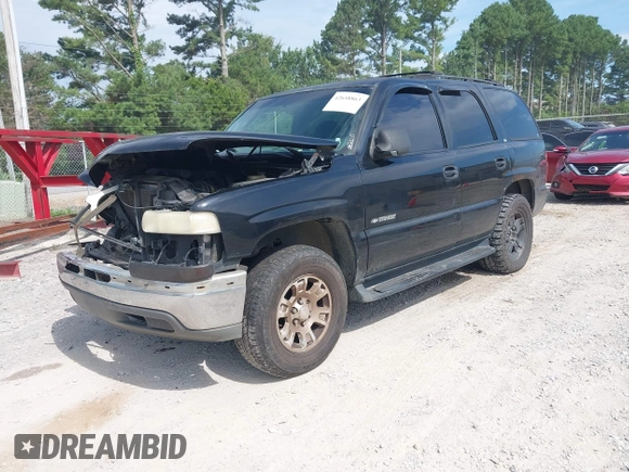 2002 Chevrolet Tahoe LS with VIN 1GNEC13Z12R249412, listed as a IAAI auction lot 42658863 with 261,383 mi miles and . Bid and sale history available at DreamBid. Image 2.