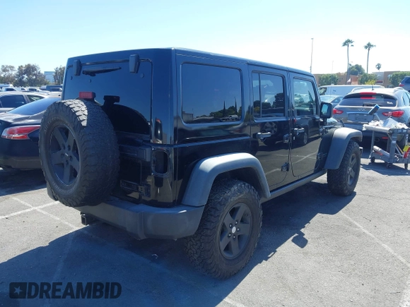 2008 Jeep Wrangler Unlimited Rubicon with VIN 1J8GA69108L574773, listed as a IAAI auction lot 42714300 with 106,974 mi miles and . Bid and sale history available at DreamBid. Image 4.