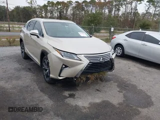 2018 Lexus RX with VIN 2T2ZZMCA9JC099803, listed as a IAAI auction lot 41052078 with 32,423 mi miles. Bid and sale history available at carsss.com. Image 1.