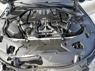 2022 BMW M8 Competition z VIN WBSAE0C02NCG86576, wystawiony jako Copart lot #39370084 z przebiegiem Nie podano mil oraz . Historia ofert i sprzedaży dostępna na DreamBid. Obrazek 12.