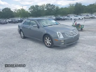 2005 Cadillac STS z VIN 1G6DW677150190519, wystawiony jako IAAI lot #42412561 z przebiegiem 108 444 mil mil oraz . Historia ofert i sprzedaży dostępna na DreamBid. Obrazek 1.