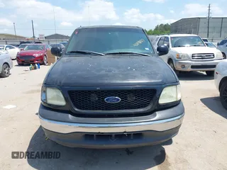 2002 Ford F-150 XLT with VIN 1FTRW07602KD37873, listed as a IAAI auction lot 42048067 with 1 mi miles. Bid and sale history available at carsss.com. Image 6.