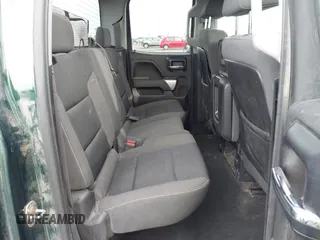 2014 Chevrolet Silverado 1500 LT with VIN 1GCVKREC7EZ312679, listed as a IAAI auction lot 40874395 with 153,234 mi miles and . Bid and sale history available at DreamBid. Image 8.