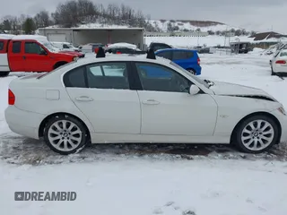 2006 BMW 3 Series 330xi with VIN WBAVD33556KL52150, listed as a IAAI auction lot 41307691 with 168,546 mi miles. Bid and sale history available at carsss.com. Image 13.