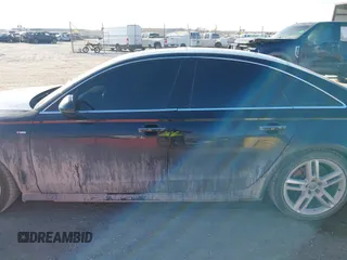2017 Audi A6 Premium z VIN WAUF8AFC5HN061978, wystawiony jako IAAI lot #41424637 z przebiegiem 168 434 mil mil oraz . Historia ofert i sprzedaży dostępna na DreamBid. Obrazek 14.