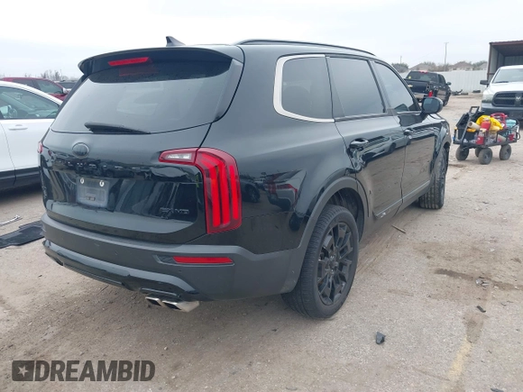 2021 Kia Telluride EX with VIN 5XYP3DHC0MG103186, listed as a IAAI auction lot 41566802 with 70,879 mi miles and . Bid and sale history available at DreamBid. Image 4.