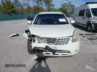 2009 Nissan Rogue SL with VIN JN8AS58T39W058077, listed as a IAAI auction lot 41311692 with 131,765 mi miles and . Bid and sale history available at DreamBid. Image 12.